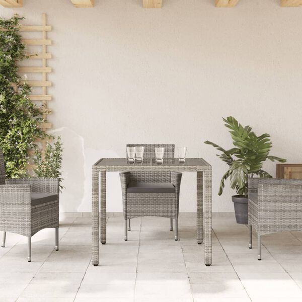 vidaXL Table de jardin dessus en verre Gris 90x90x75 cm R&eacute;sine tress&eacute;e