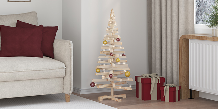 Arbre de Noël minimaliste en bois avec lumières et ornements, à côté de cadeaux emballés. Cliquez pour voir les produits de la collection.